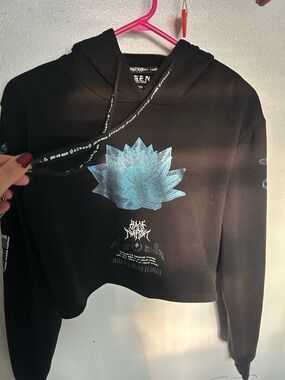 MIND OF ZEN by Rage Nation crop top hoodie with Iridescent Blue Lotus Graphic